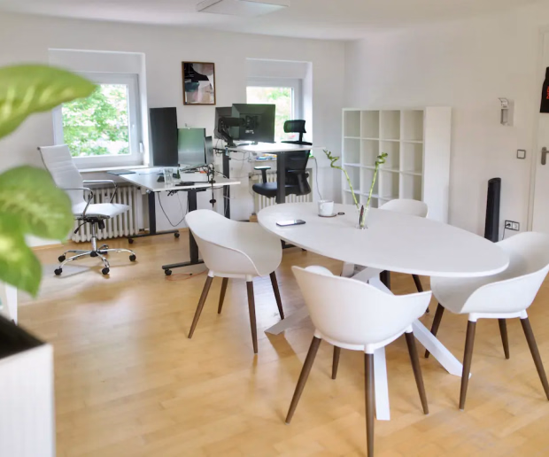 Laramate agency office with workstations and a meeting table